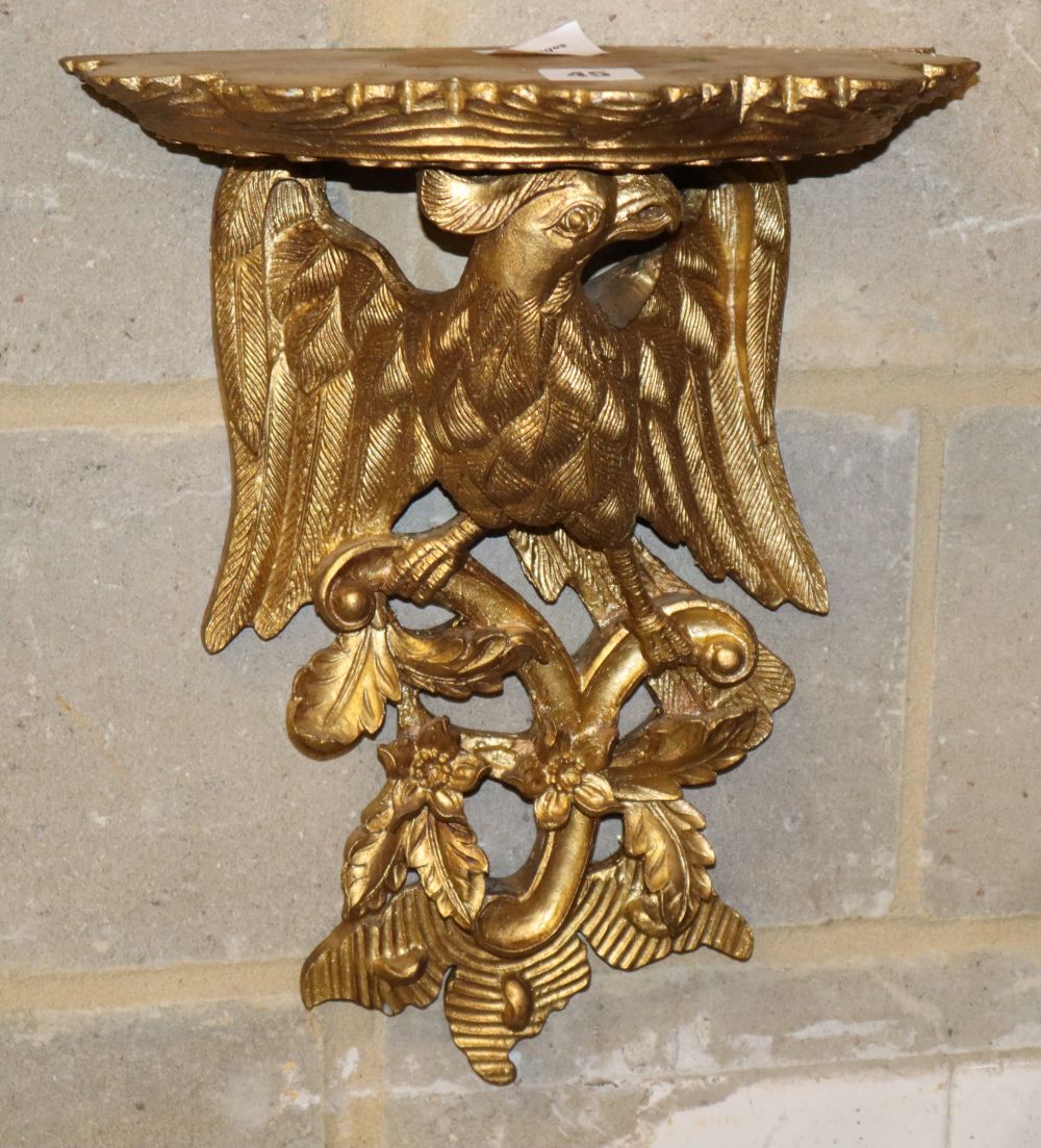 A George III style carved giltwood eagle and foliate design bracket, W.32cm, H.42cm
